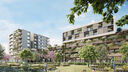 mehrstöckige moderne Wohngebäude mit begrünten Fassaden und Gartenanlage im Vordergrund unter blauem Himmel